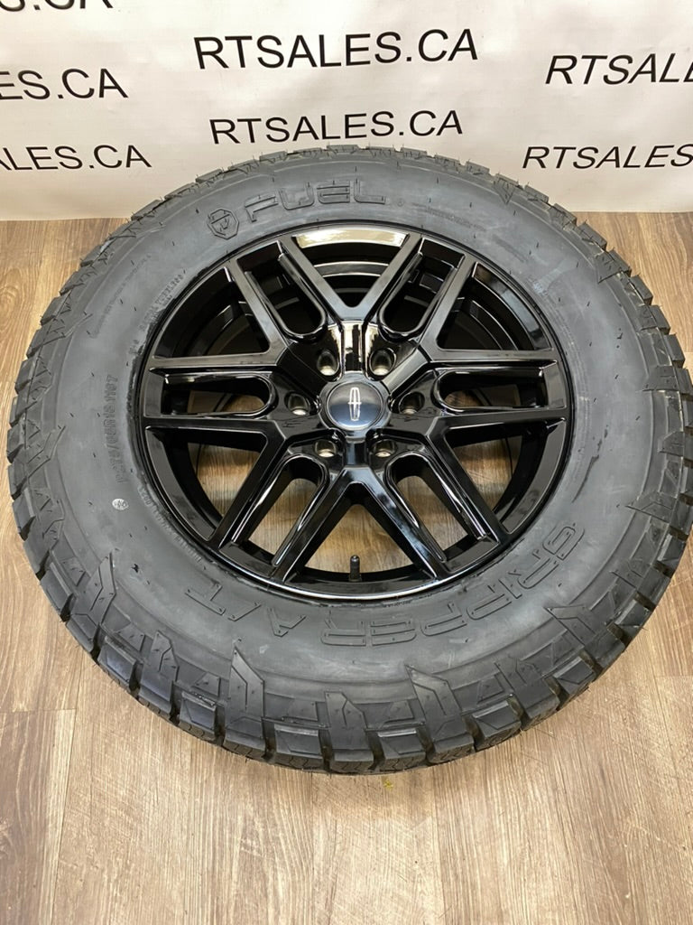 275/65/18 Fuel Gripper A/T All season tires rims Ford F-150