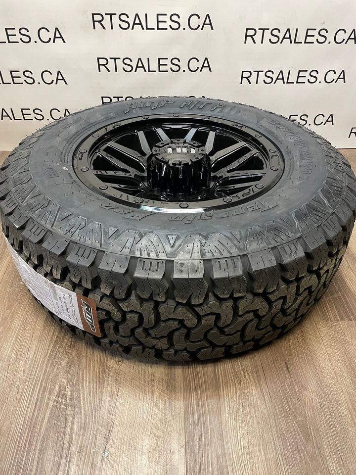 275/70/18 AMP All weather tires Black Rims GMC Chevy 2500 3500