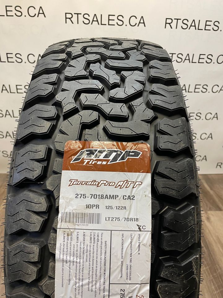 275/70/18 AMP All weather tires Black Rims GMC Chevy 2500 3500