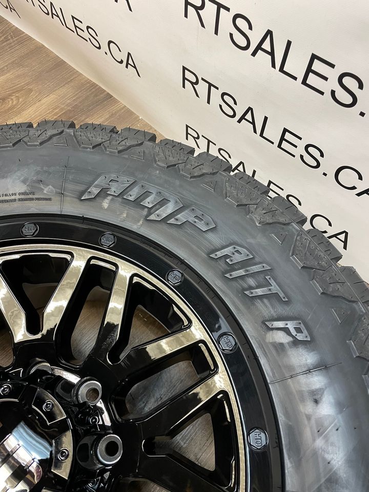 275/70/18 AMP All weather tires Black Rims GMC Chevy 2500 3500