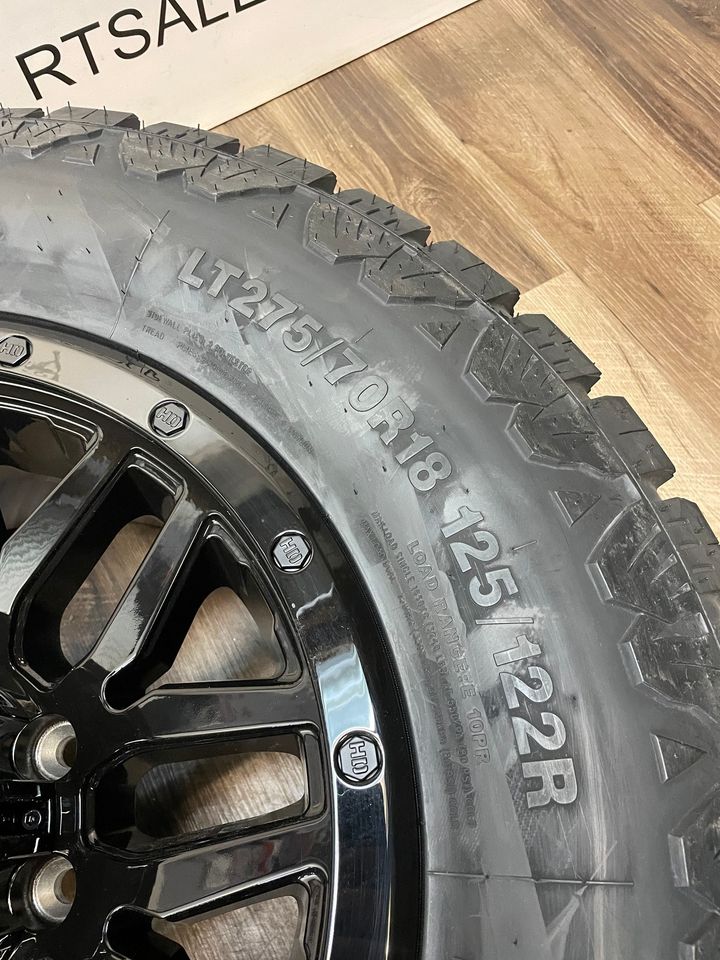 275/70/18 AMP All weather tires Black Rims GMC Chevy 2500 3500