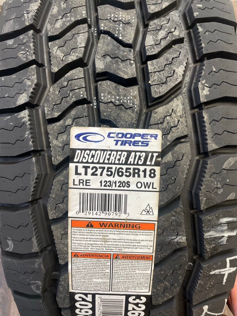LT 275/65/18 Cooper Discoverer AT3 LR-E / A.W (Set of Four)