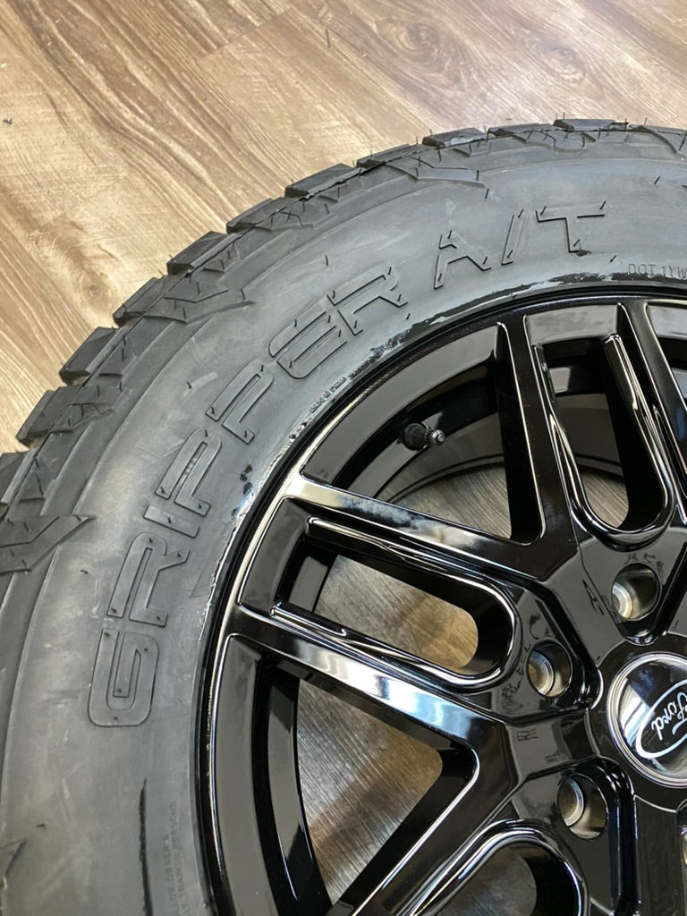 275/65/18 Fuel Gripper A/T All season tires rims Ford F-150