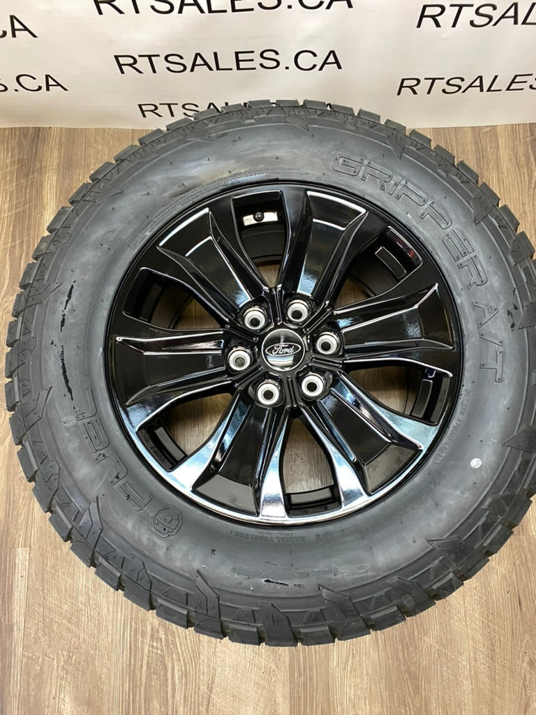 275/65/18 Fuel Gripper A/T All season tires rims Ford F-150