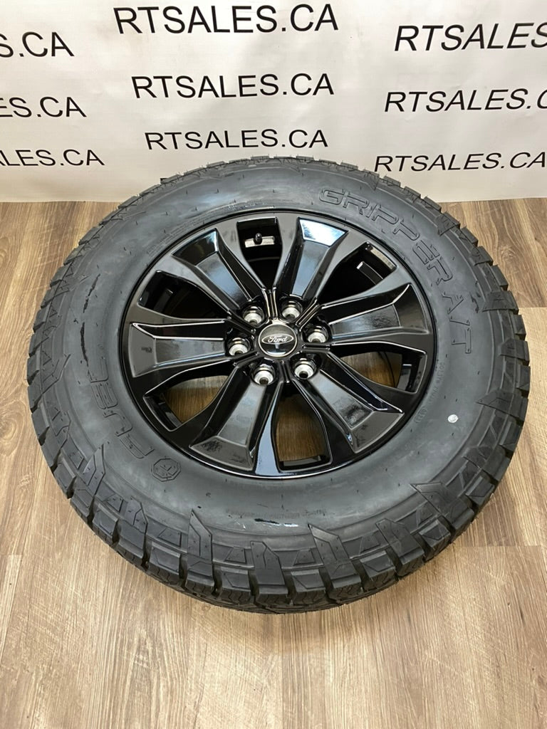 275/65/18 Fuel Gripper A/T All season tires rims Ford F-150