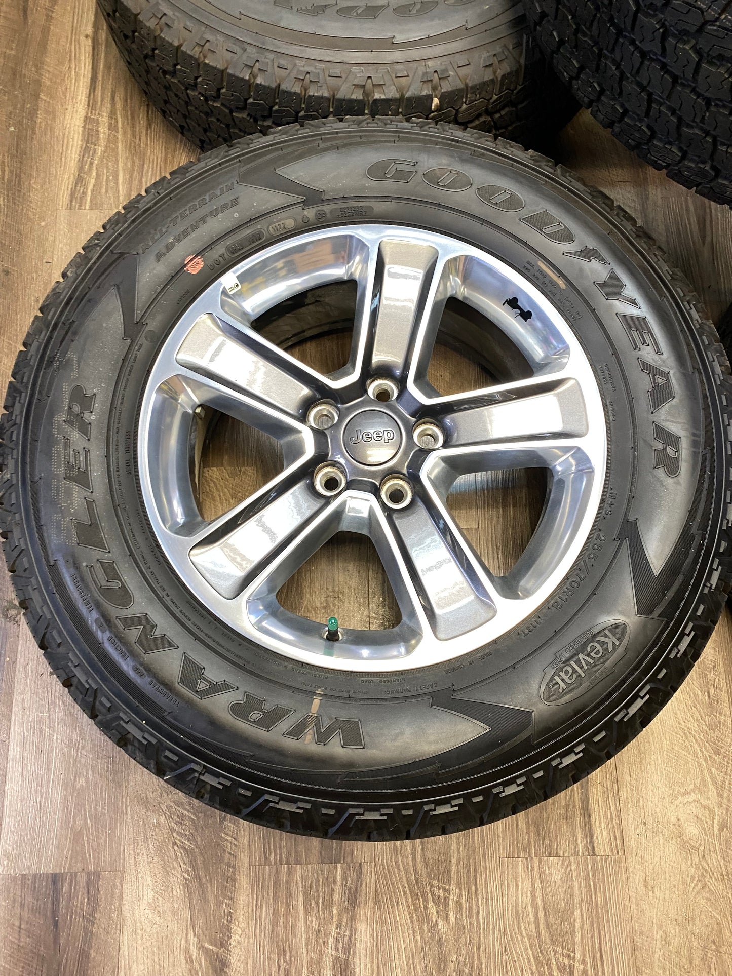 255/70/18 Goodyear AT Tires 18 inch Jeep Factory OEM Rims 5x127 (Set of Five)