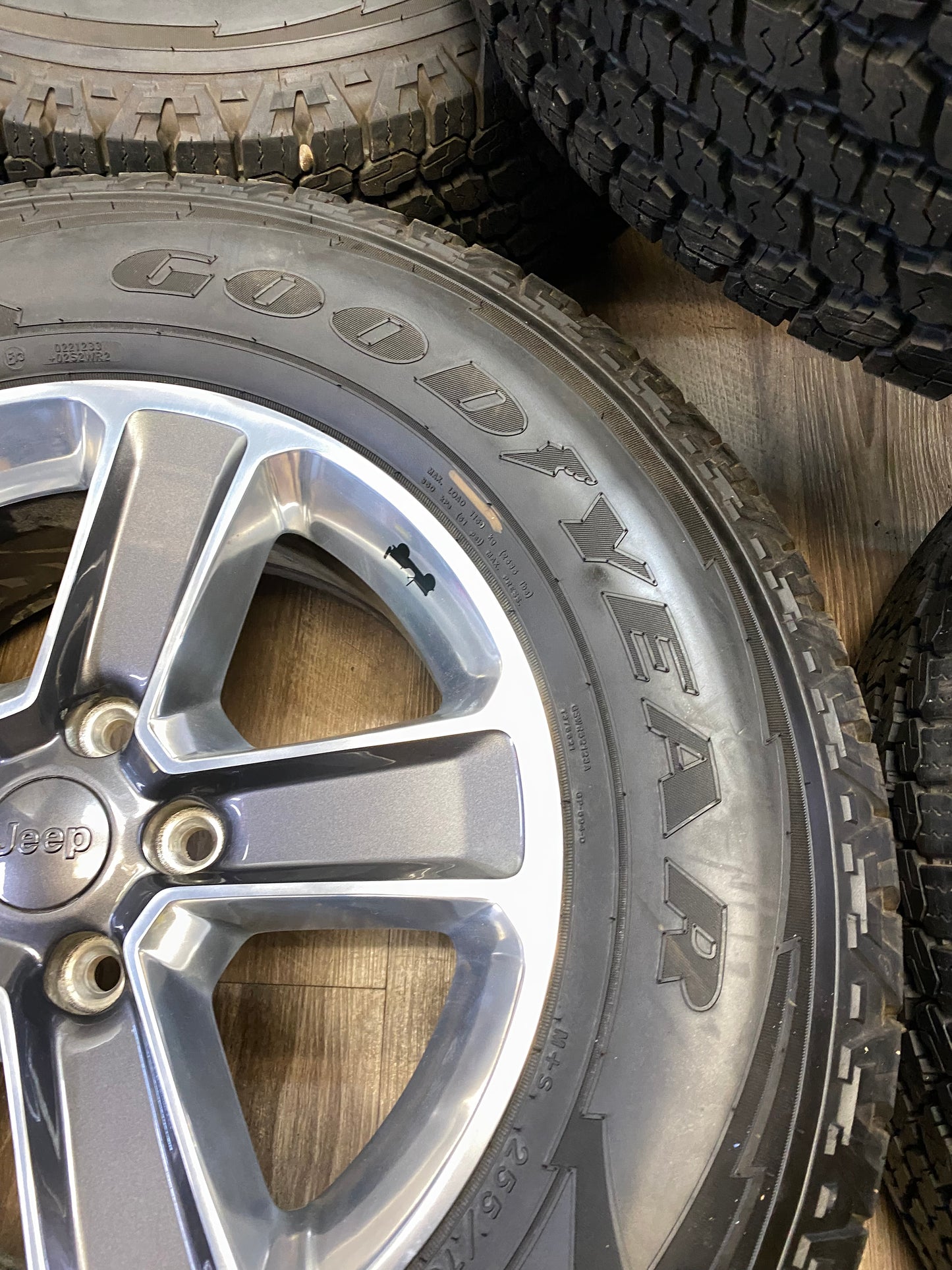 255/70/18 Goodyear AT Tires 18 inch Jeep Factory OEM Rims 5x127 (Set of Five)