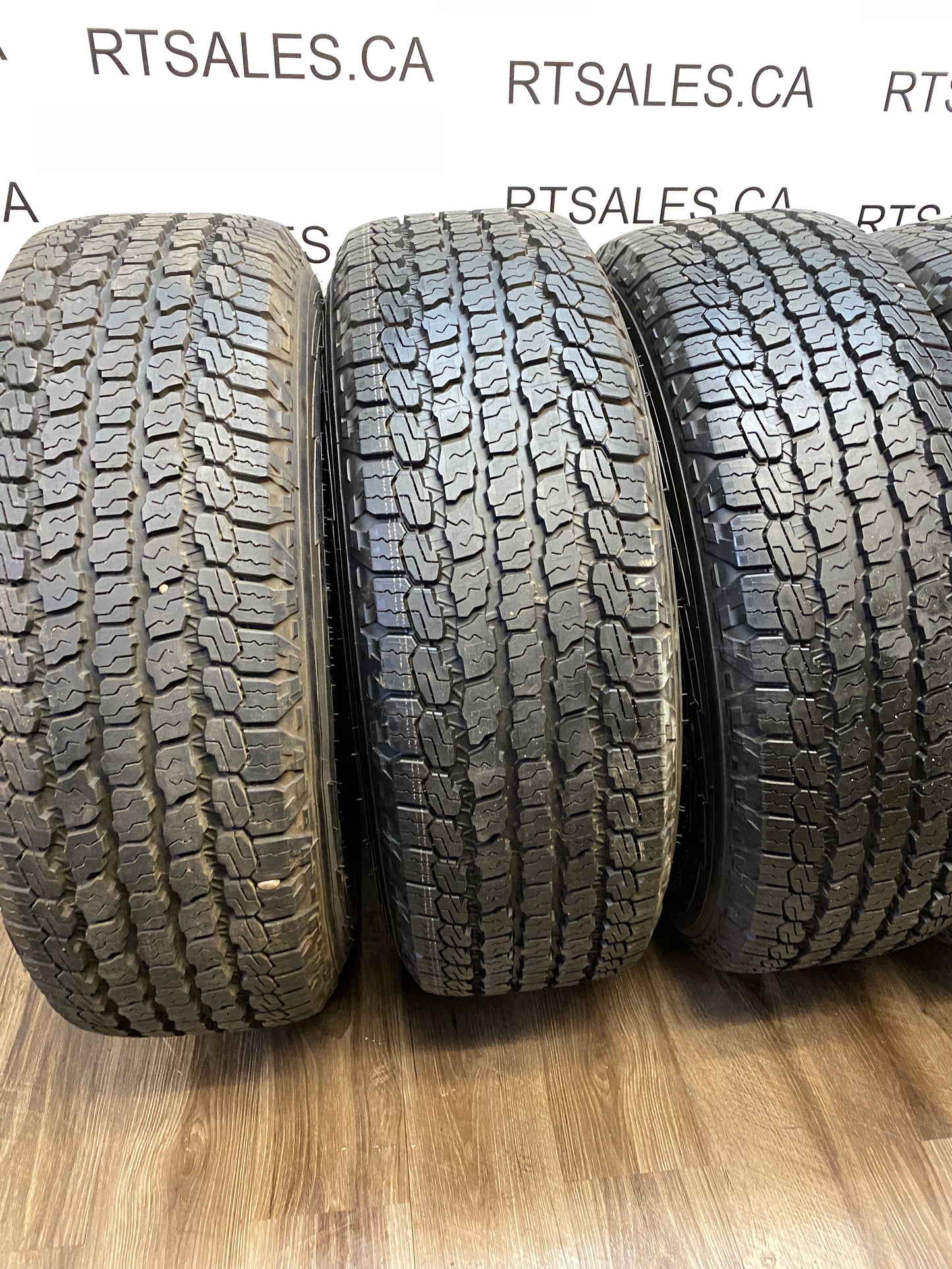 255/70/18 Goodyear AT Tires 18 inch Jeep Factory OEM Rims 5x127 (Set of Five)