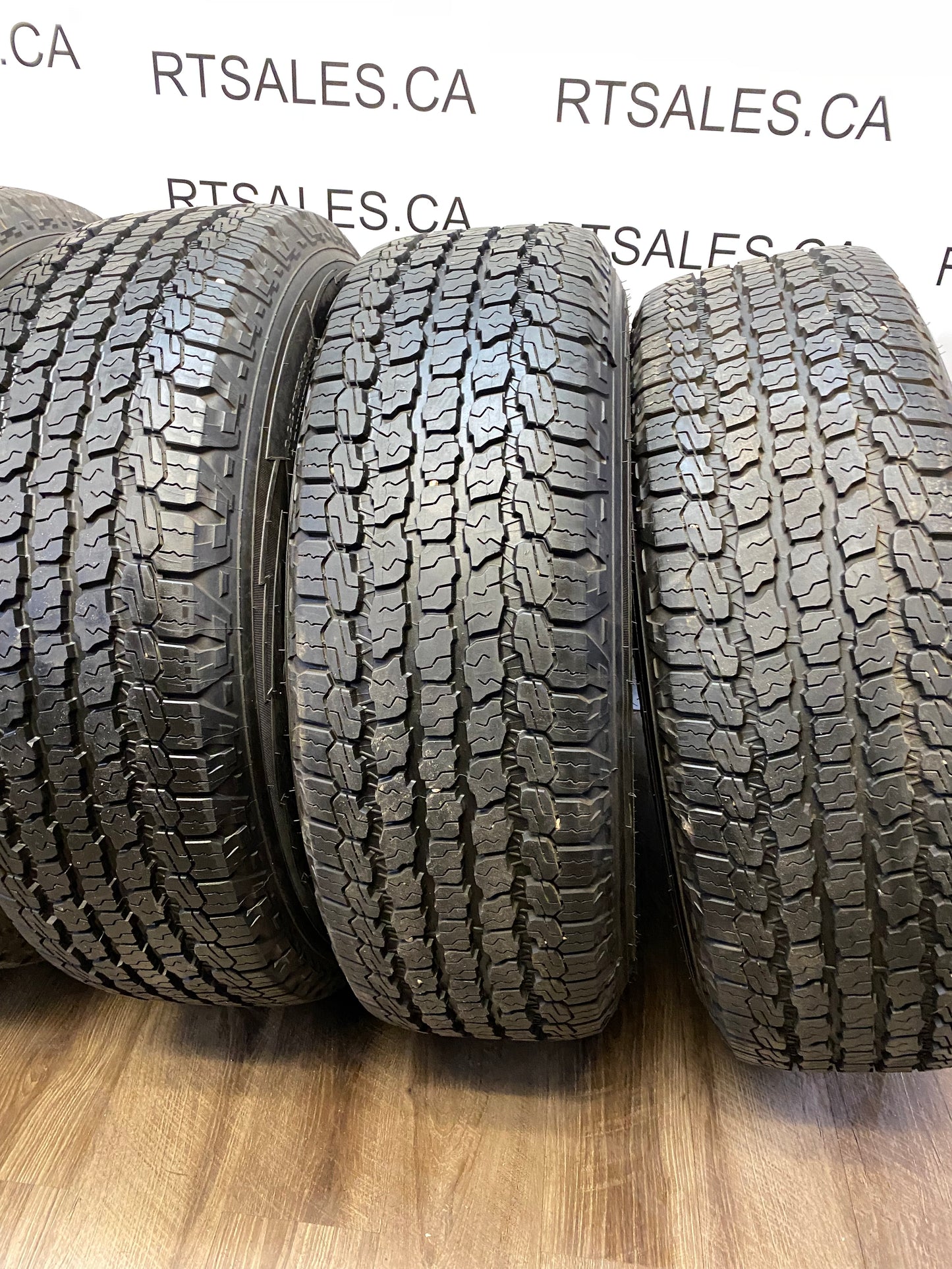 255/70/18 Goodyear AT Tires 18 inch Jeep Factory OEM Rims 5x127 (Set of Five)