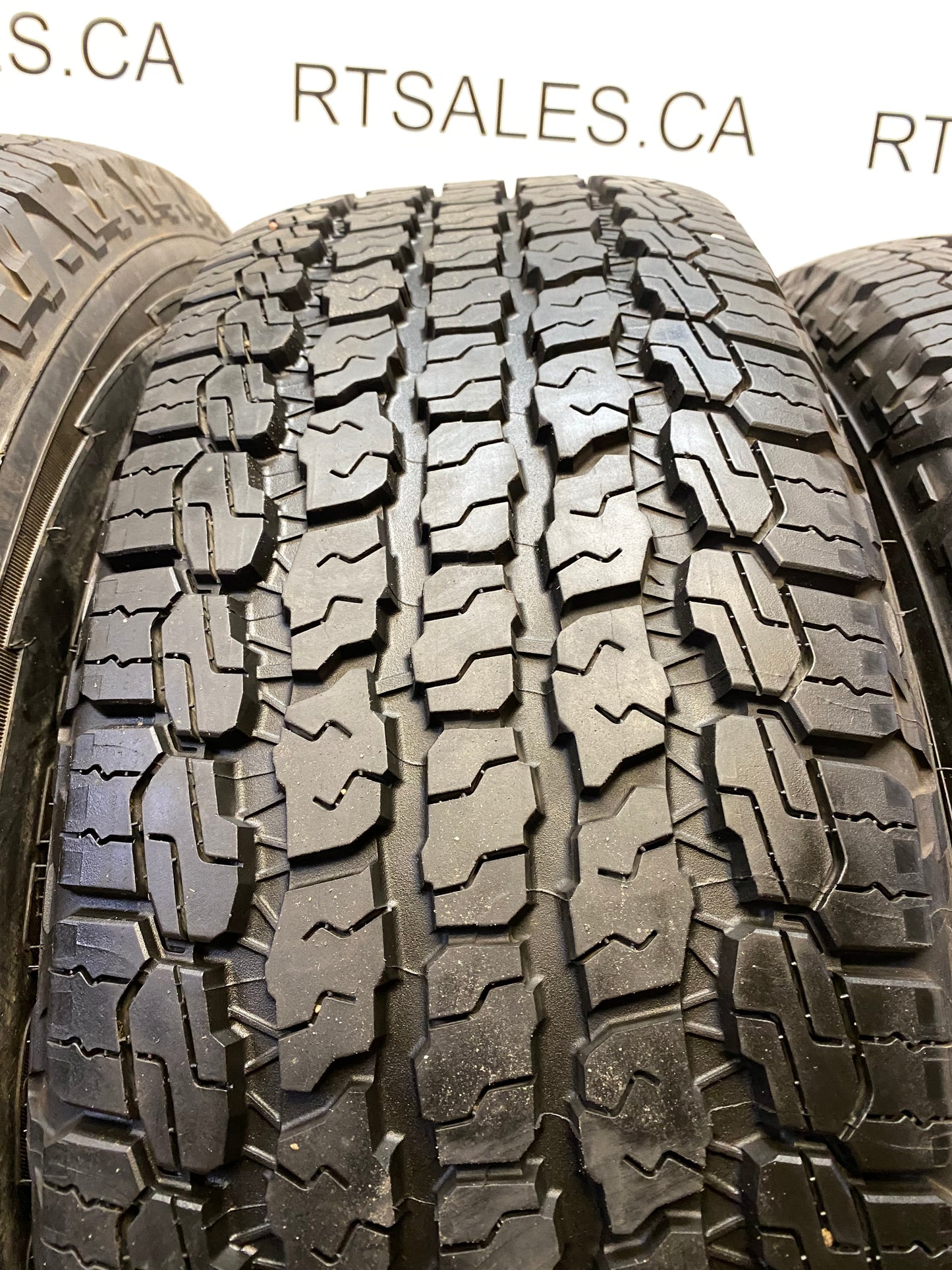 255/70/18 Goodyear AT Tires 18 inch Jeep Factory OEM Rims 5x127 (Set of Five)