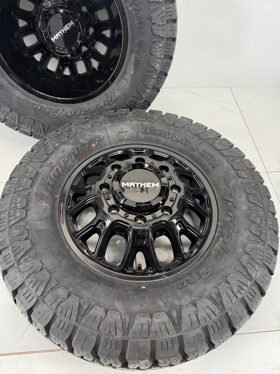 LT285/70/17 Amp Tires Mayhem Dually Rims 17 inch