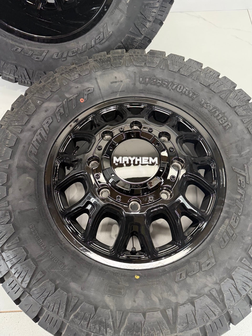 LT285/70/17 Amp Tires Mayhem Dually Rims 17 inch