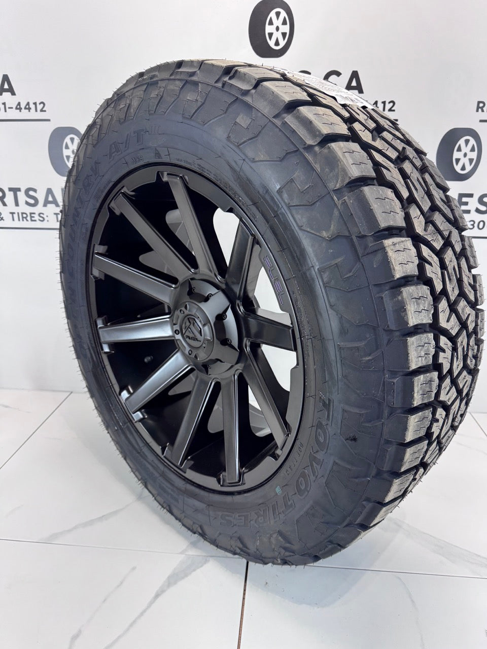 LT 275/60/20 Toyo AT3 All Weather Tires on 20" Fuel Contra Rims 6x135/139