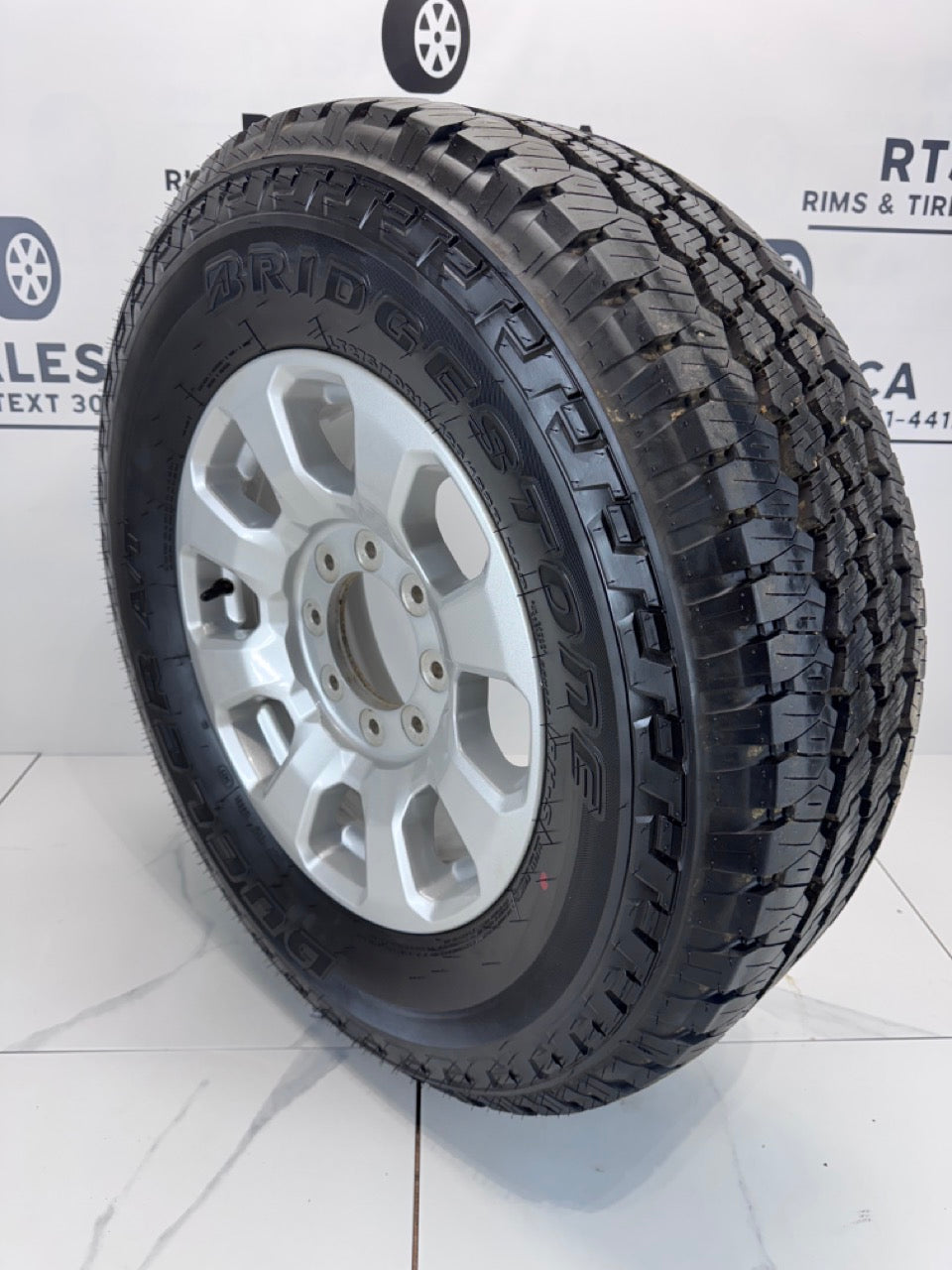 LT 275/70/18 Bridgestone tires Rims Ford F250 F350 8x170 OEM