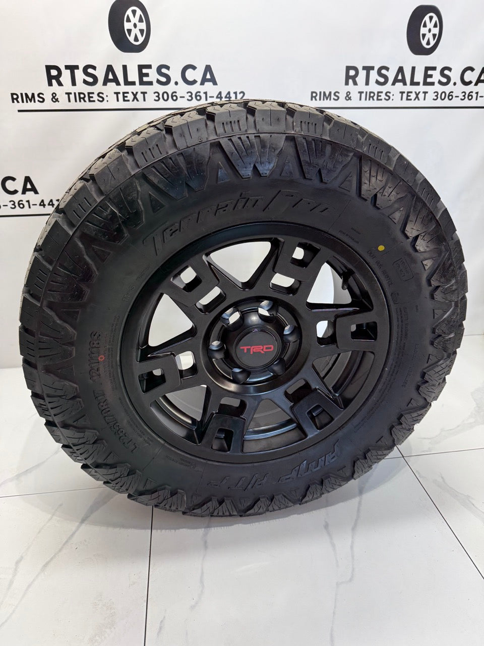 265/70/17 AMP Pro All Terrain Tires on 17" Replica Rims 6x139