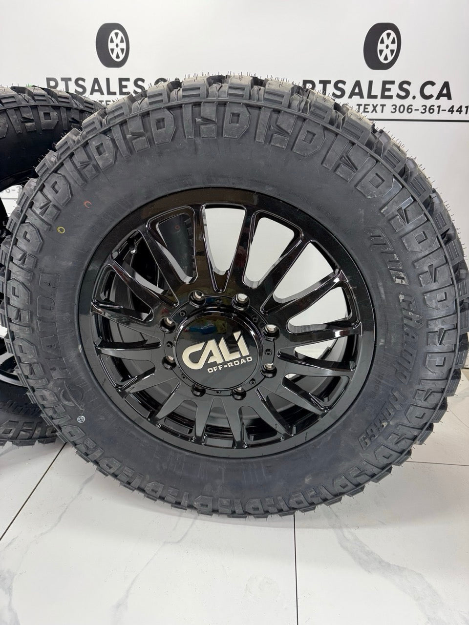 Haida Mud tires on 20x8.25 Cali Summit Gloss Black Dually Rims