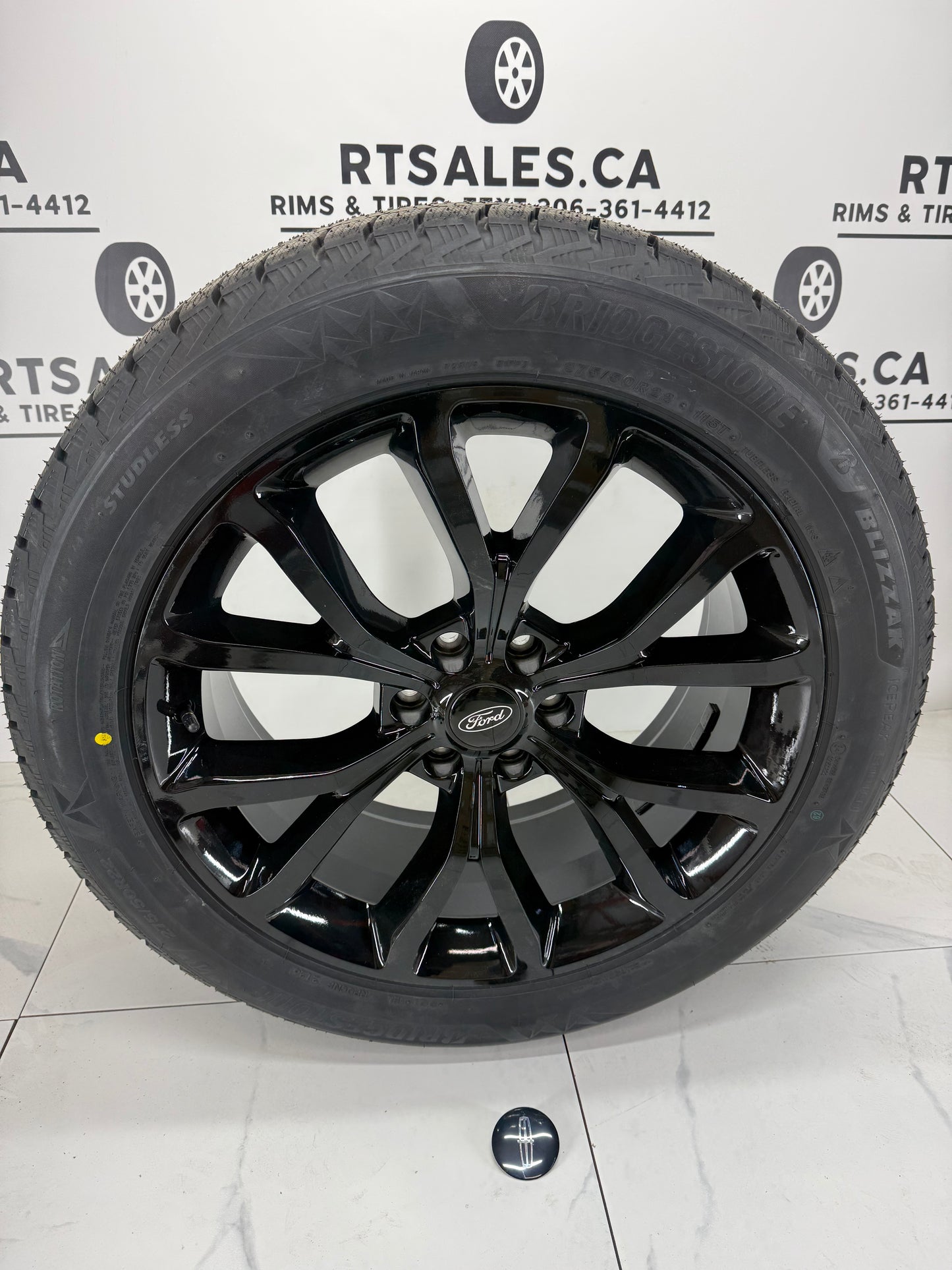 Bridgestone Blizzak Icepeak Winter Tires on 22" Ford F-150 Rims