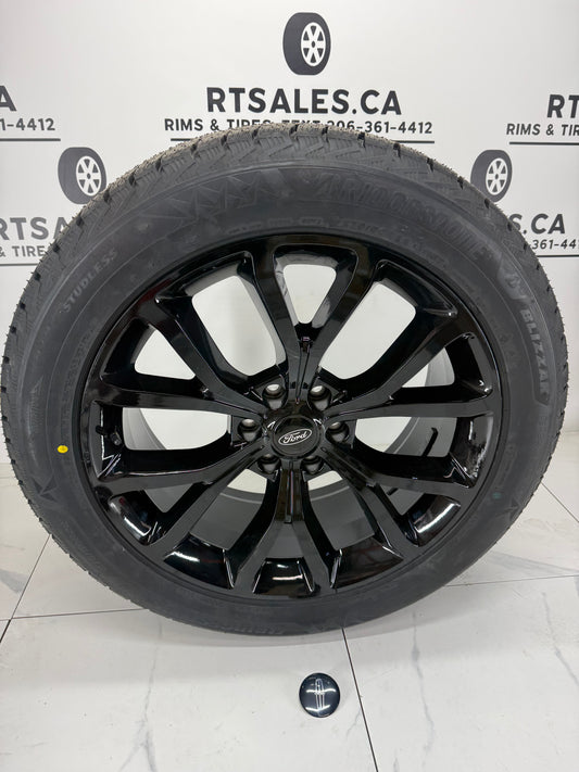 Bridgestone Blizzak Icepeak Winter Tires on 22" Ford F-150 Rims