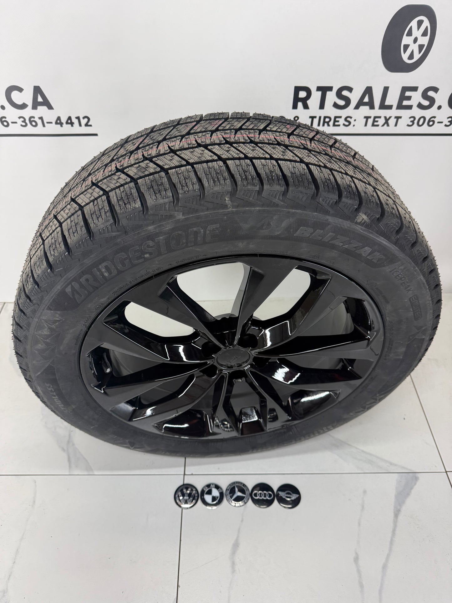 Bridgestone Icepeak Winter Tires on 18" Black RT Rims 5x112