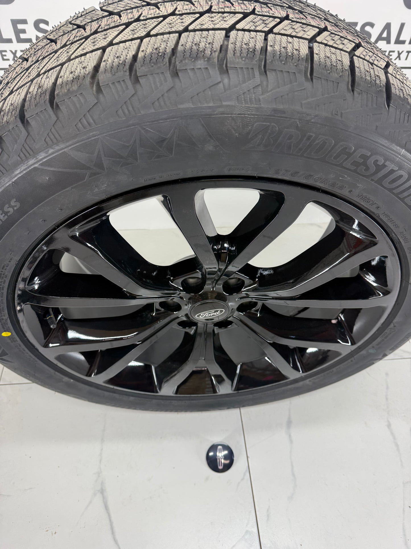 Bridgestone Blizzak Icepeak Winter Tires on 22" Ford F-150 Rims