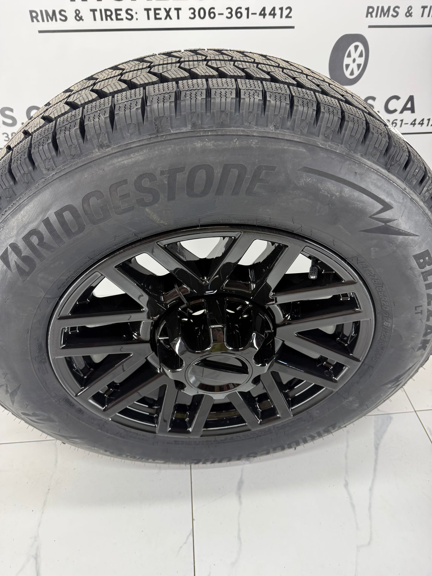 275/65/20 Bridgestone Blizzak Winter Tires on 20" Ford Super Duty Replica Rims 8x170
