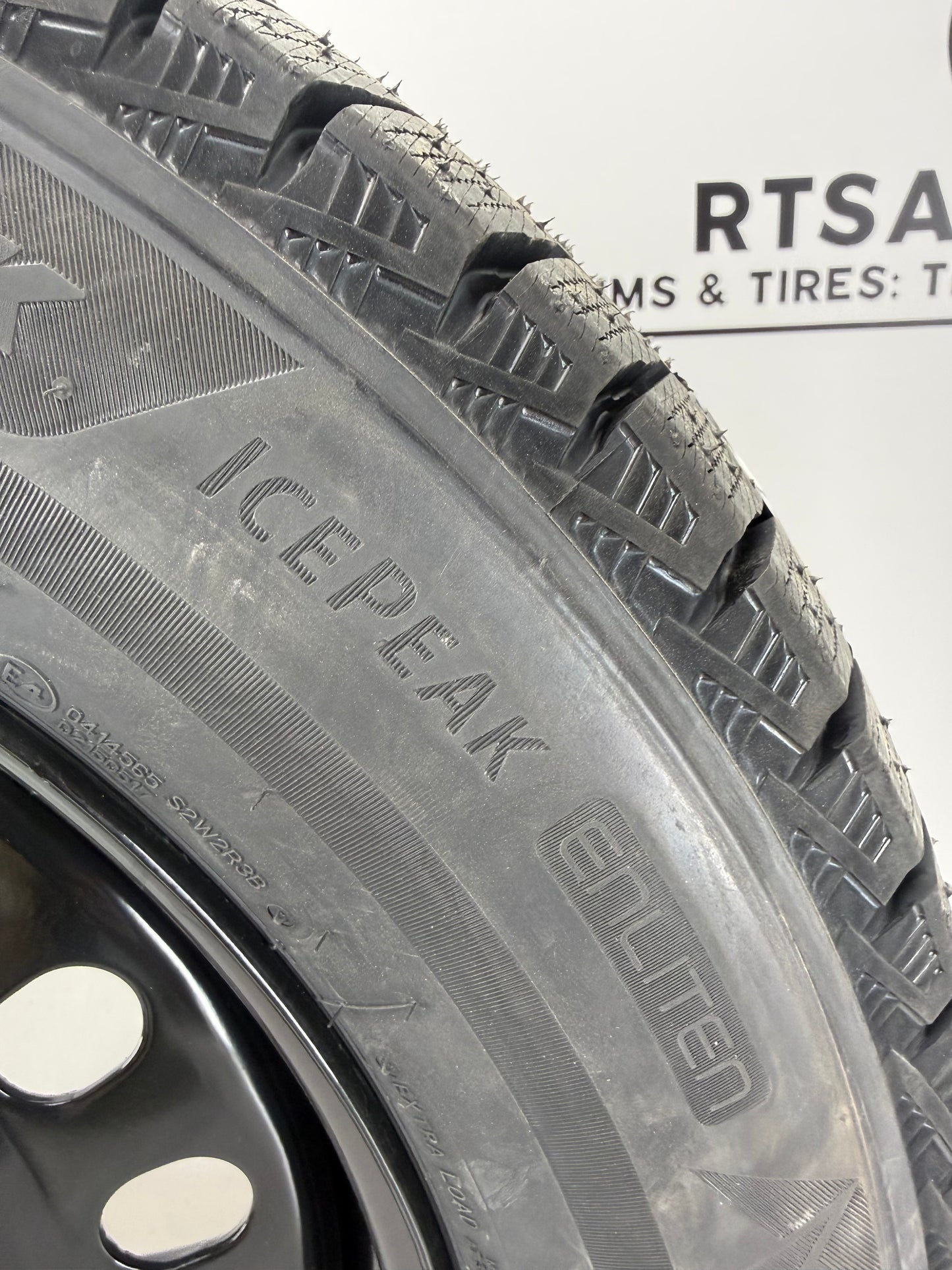 Bridgestone Blizzak Icepeak winter tire on a black steel rim - R&T Sales