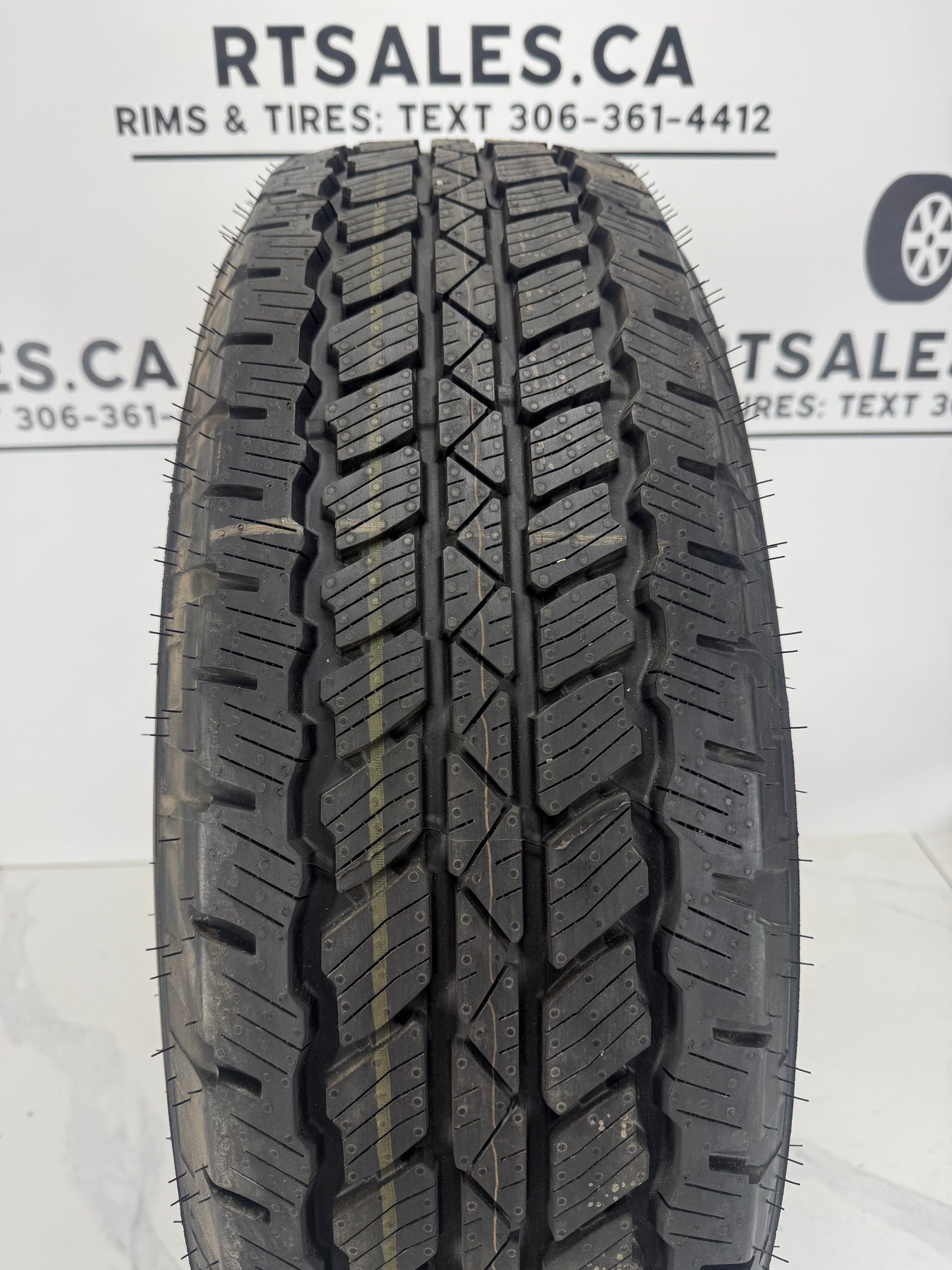 255/75R17 Bridgestone Dueler A/T RH-S all season tire tread — new takeoffs at R&T Sales Saskatoon