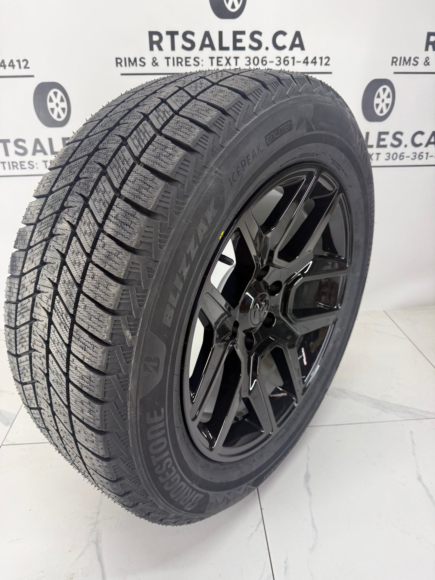 Bridgestone Icepeak Winter Tires on 6x139 Black Replica Ram 1500 Rims – 18", 20", 22"