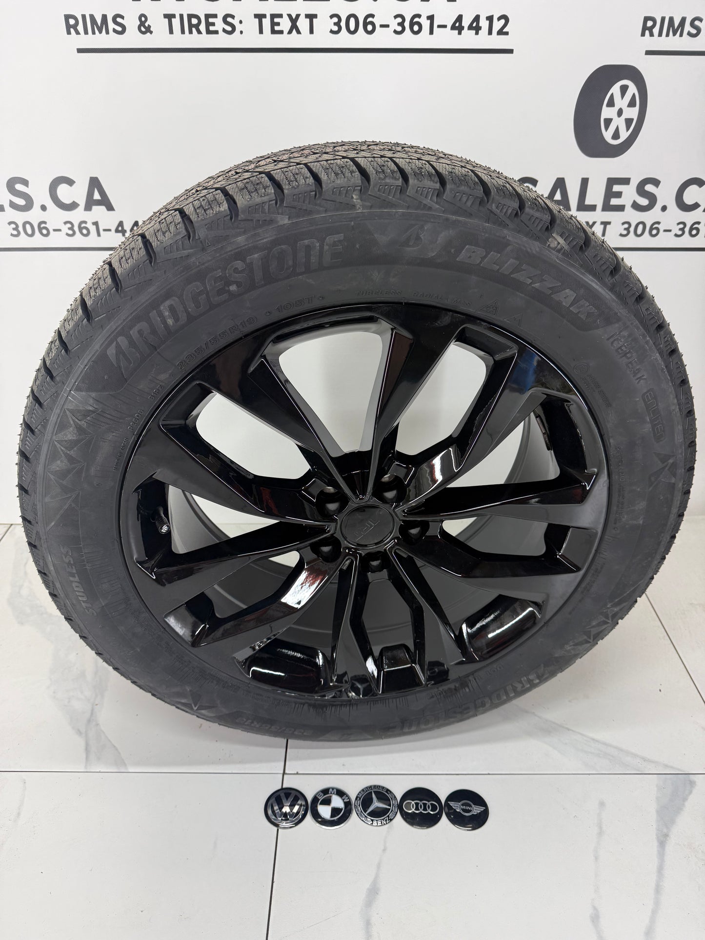 Bridgestone Icepeak Winter Tires on 18" Black RT Rims 5x112