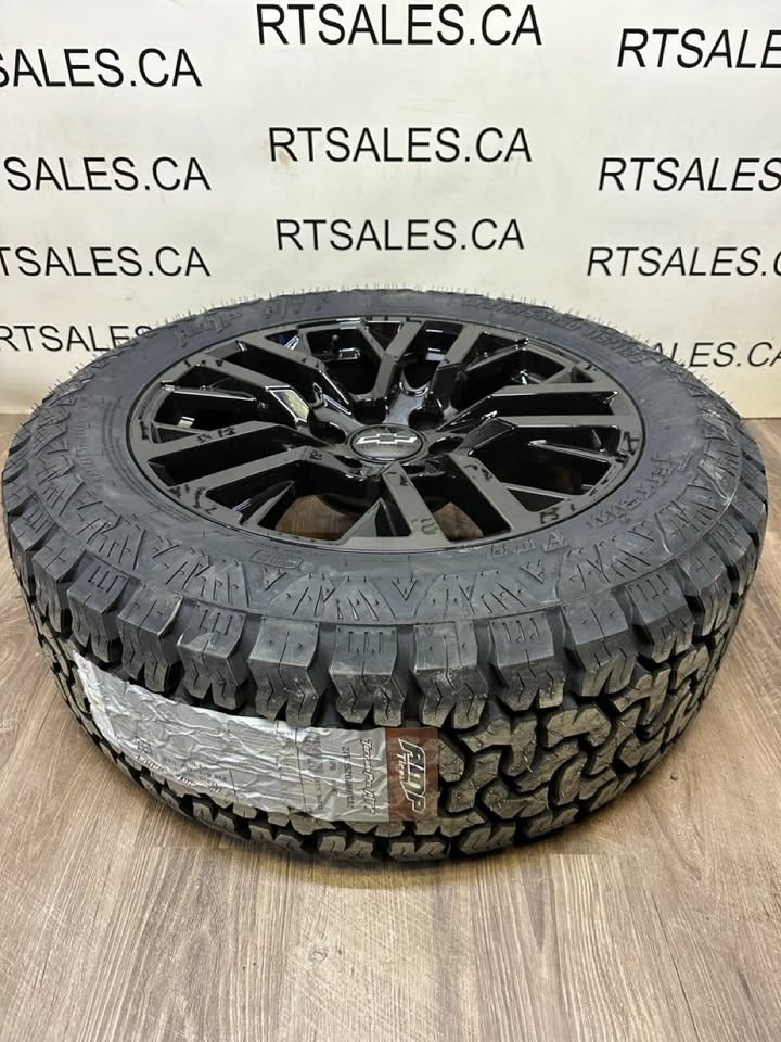 275/55/20 All season tires on rims Chevy GMC 1500