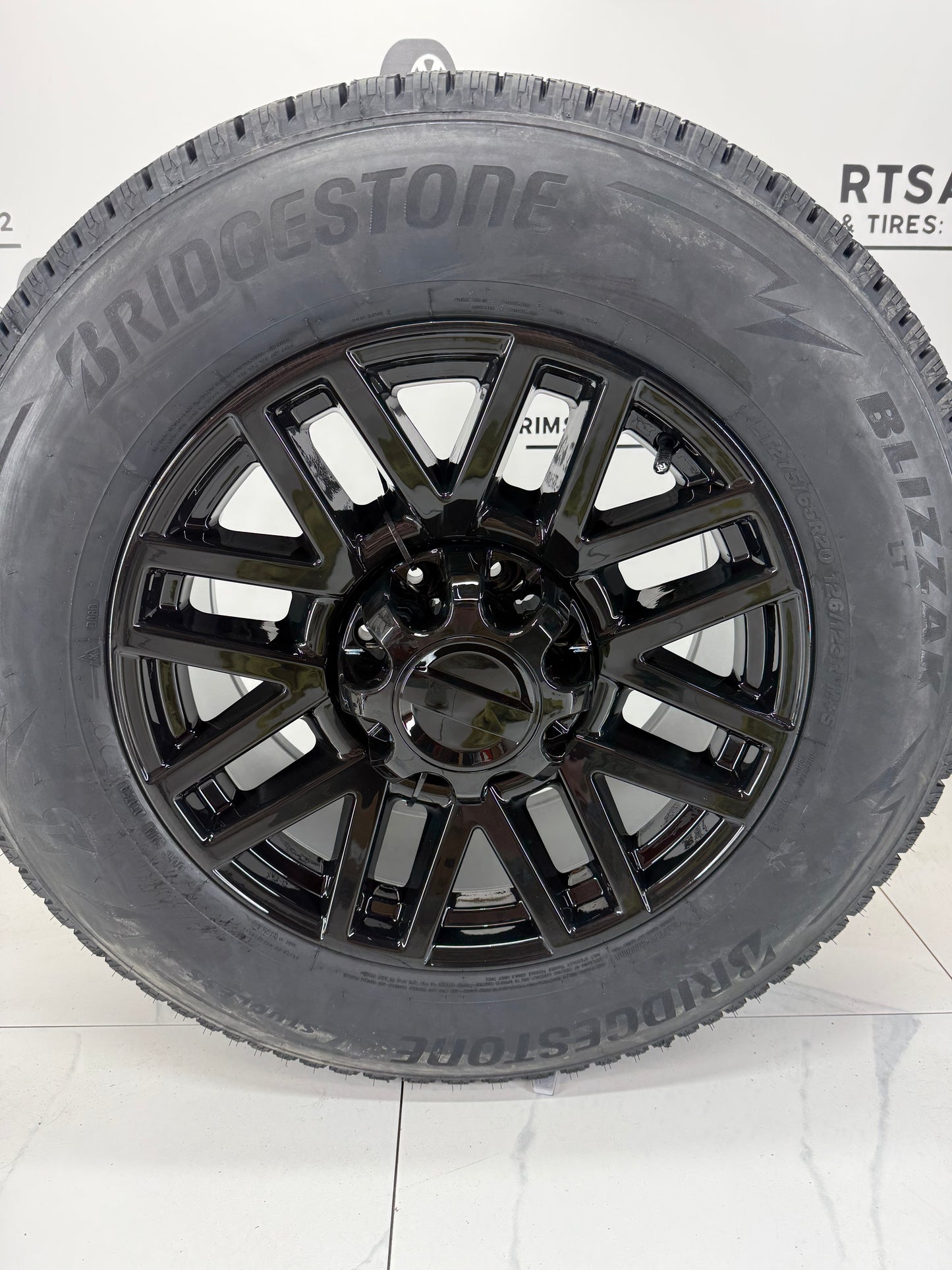 275/65/20 Bridgestone Blizzak Winter Tires on 20" Ford Super Duty Replica Rims 8x170