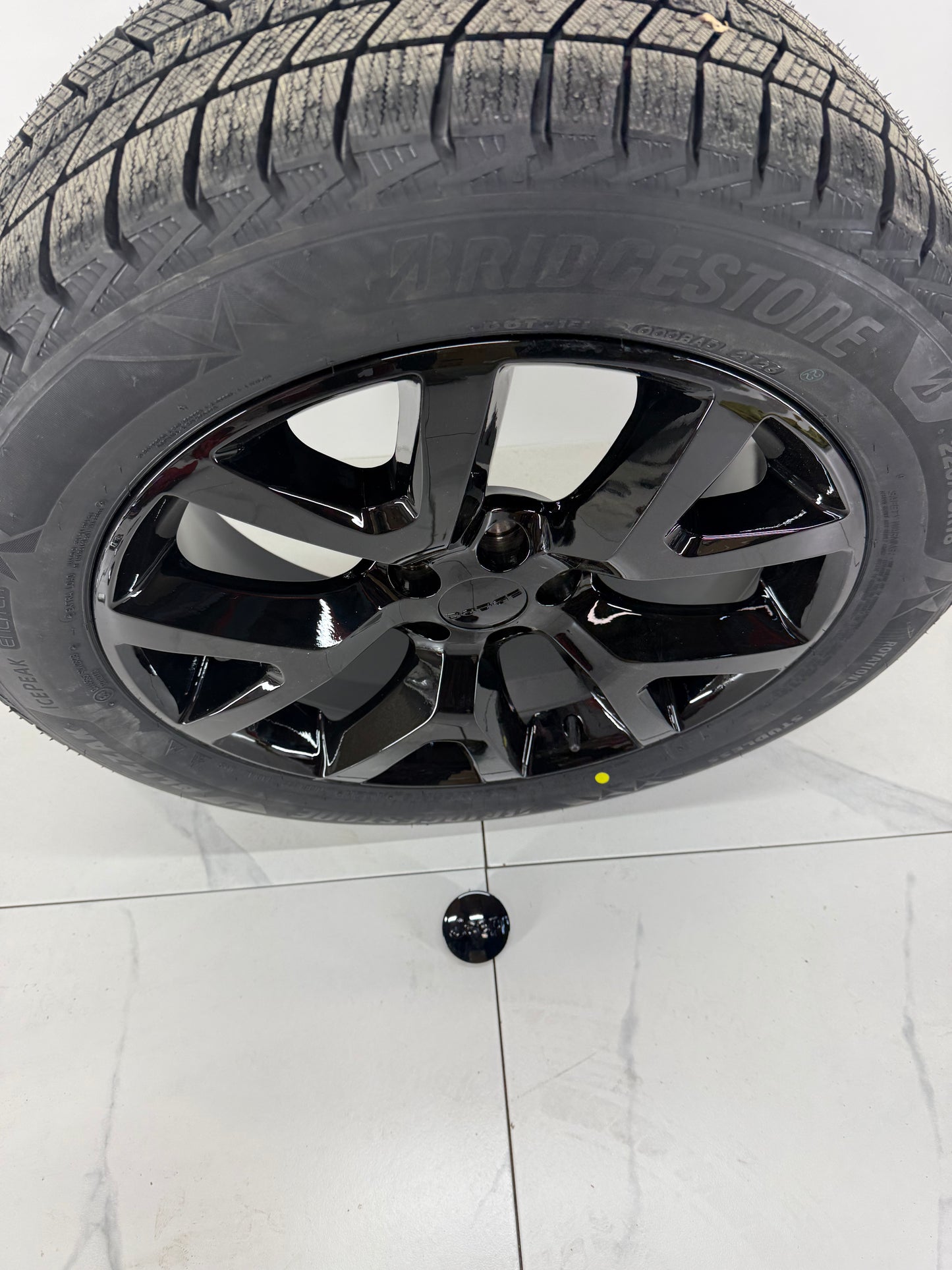Bridgestone Blizzak Icepeak Winter Tires on 18" Replica 105 Rims 5x110