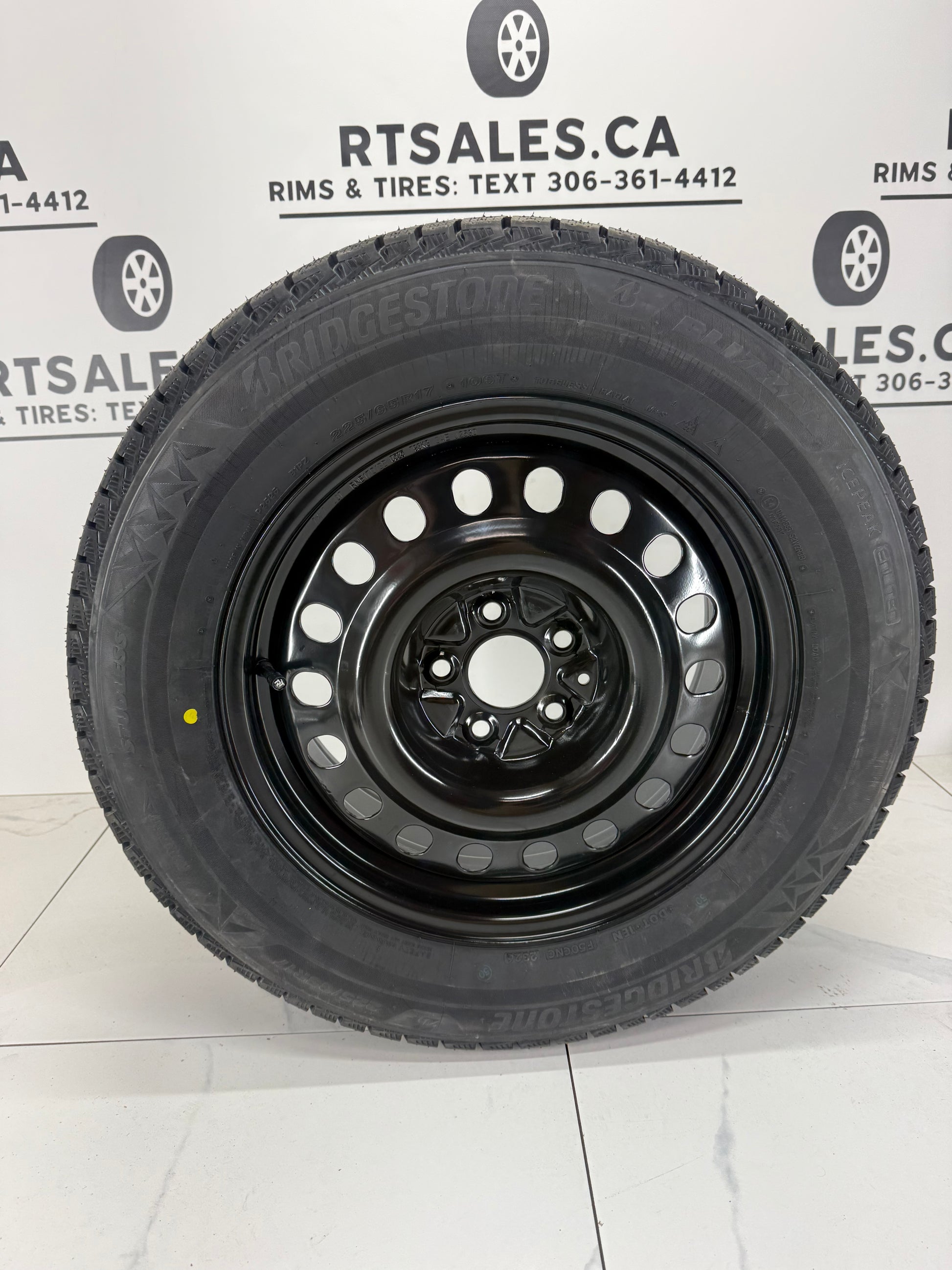 Bridgestone Blizzak Icepeak winter tire on a black steel rim - R&T Sales