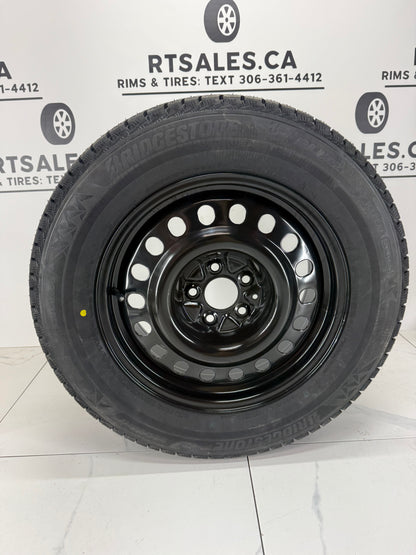 Bridgestone Blizzak Icepeak winter tire on a black steel rim - R&T Sales