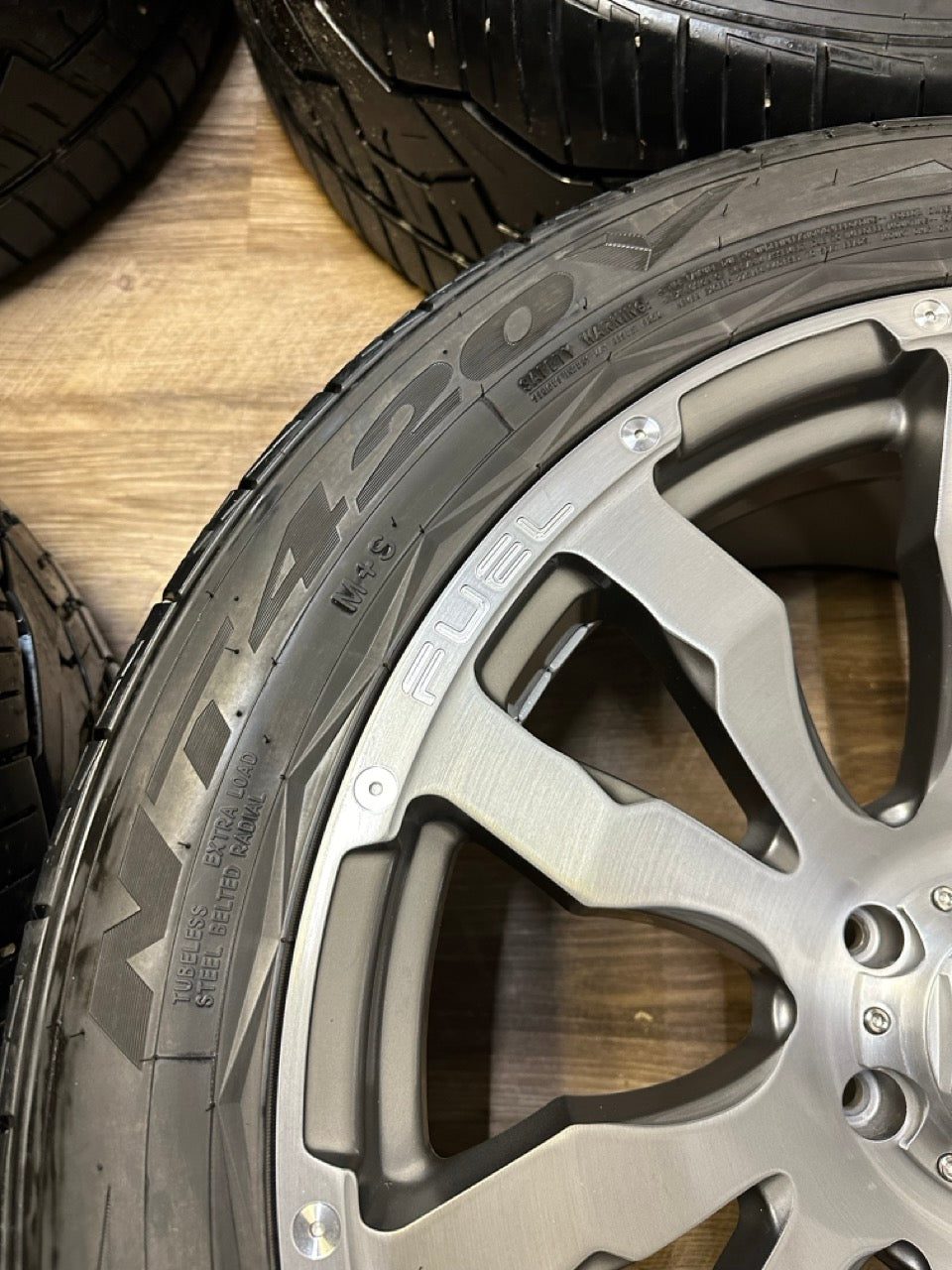 305/40/22 Nitto All-Season Tires on Fuel Blitz rims 6x139.7