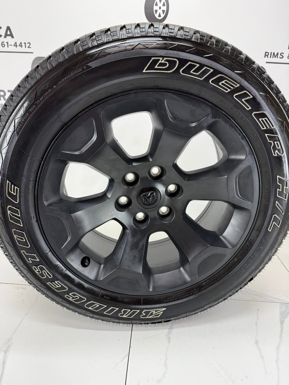 275/55/20 Bridgestone tires Ram 1500 rims 6x139 (Takeoffs)