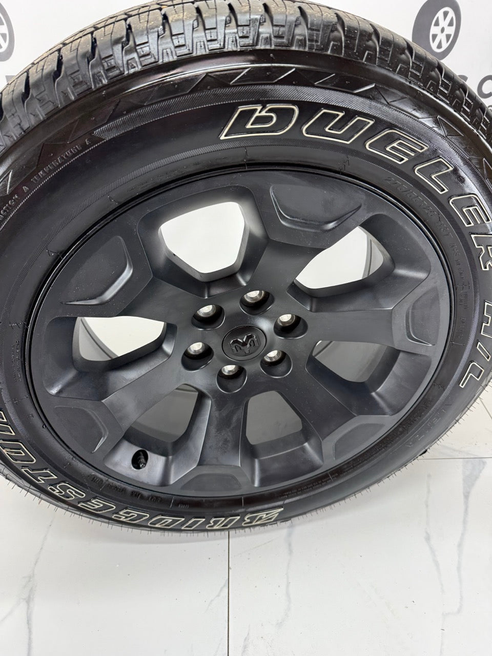 275/55/20 Bridgestone tires Ram 1500 rims 6x139 (Takeoffs)