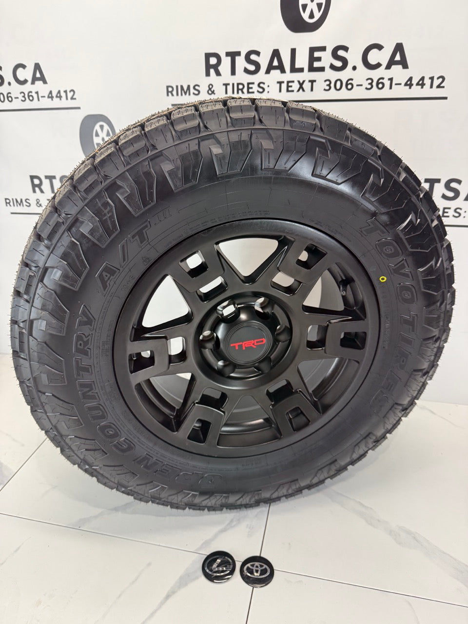 LT 265/70/17 Toyo 17x8 Replika R213 Rims 6x139