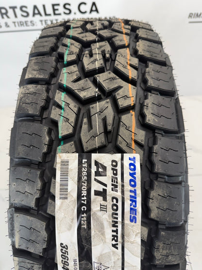 LT 265/70/17 Toyo 17x8 Replika R213 Rims 6x139