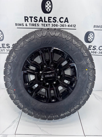 275/70/18 Amp tires Rims 8x180. GMC Chevy 2500 3500