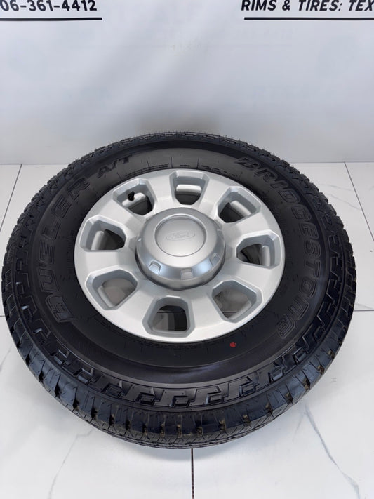 LT 275/70/18 Bridgestone tires Rims Ford F250 F350 8x170 OEM