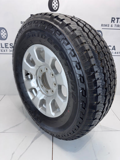 LT 275/70/18 Bridgestone tires Rims Ford F250 F350 8x170 OEM