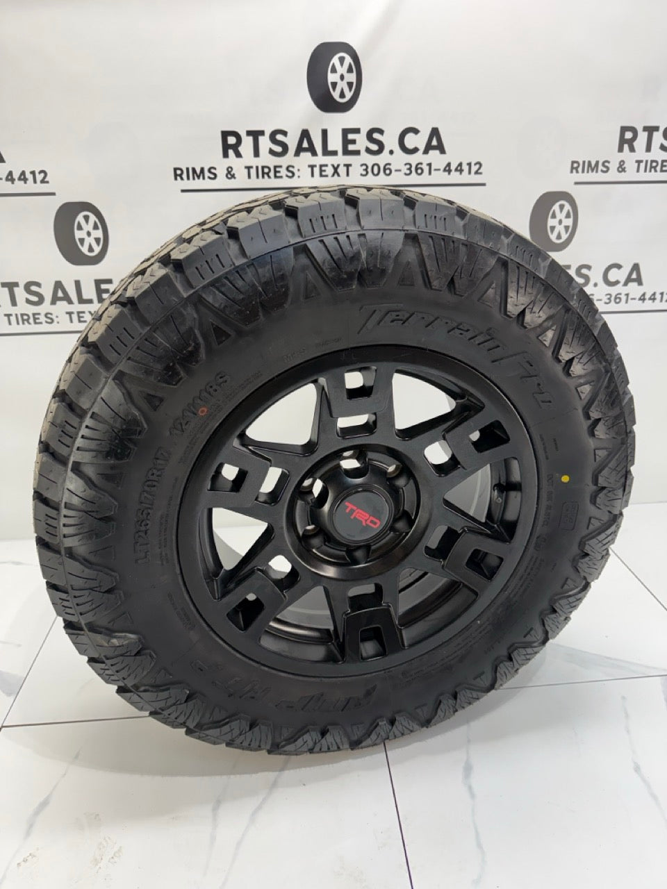 265/70/17 AMP Pro All Terrain Tires on 17" Replica Rims 6x139