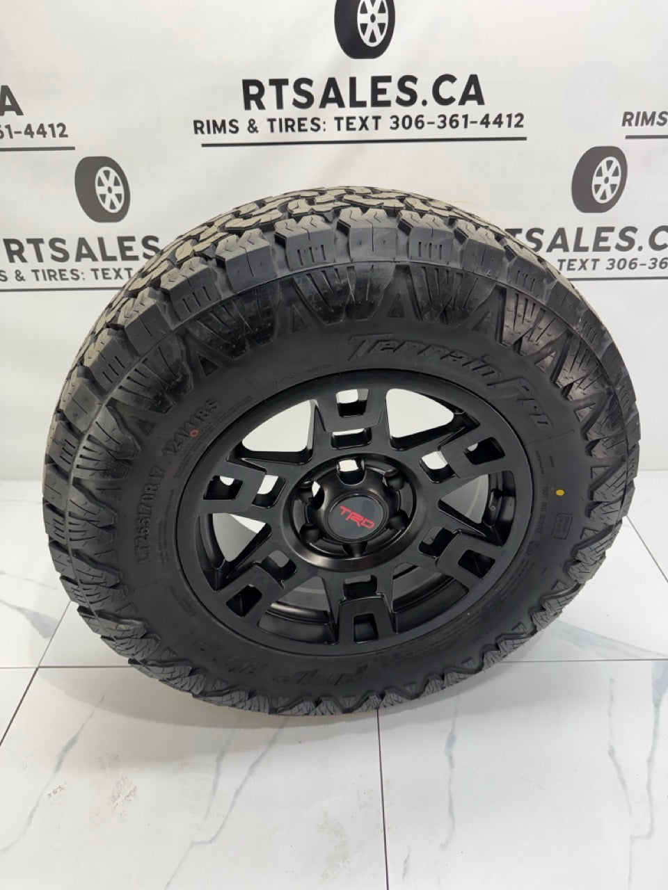 265/70/17 AMP Pro All Terrain Tires on 17" Replica Rims 6x139