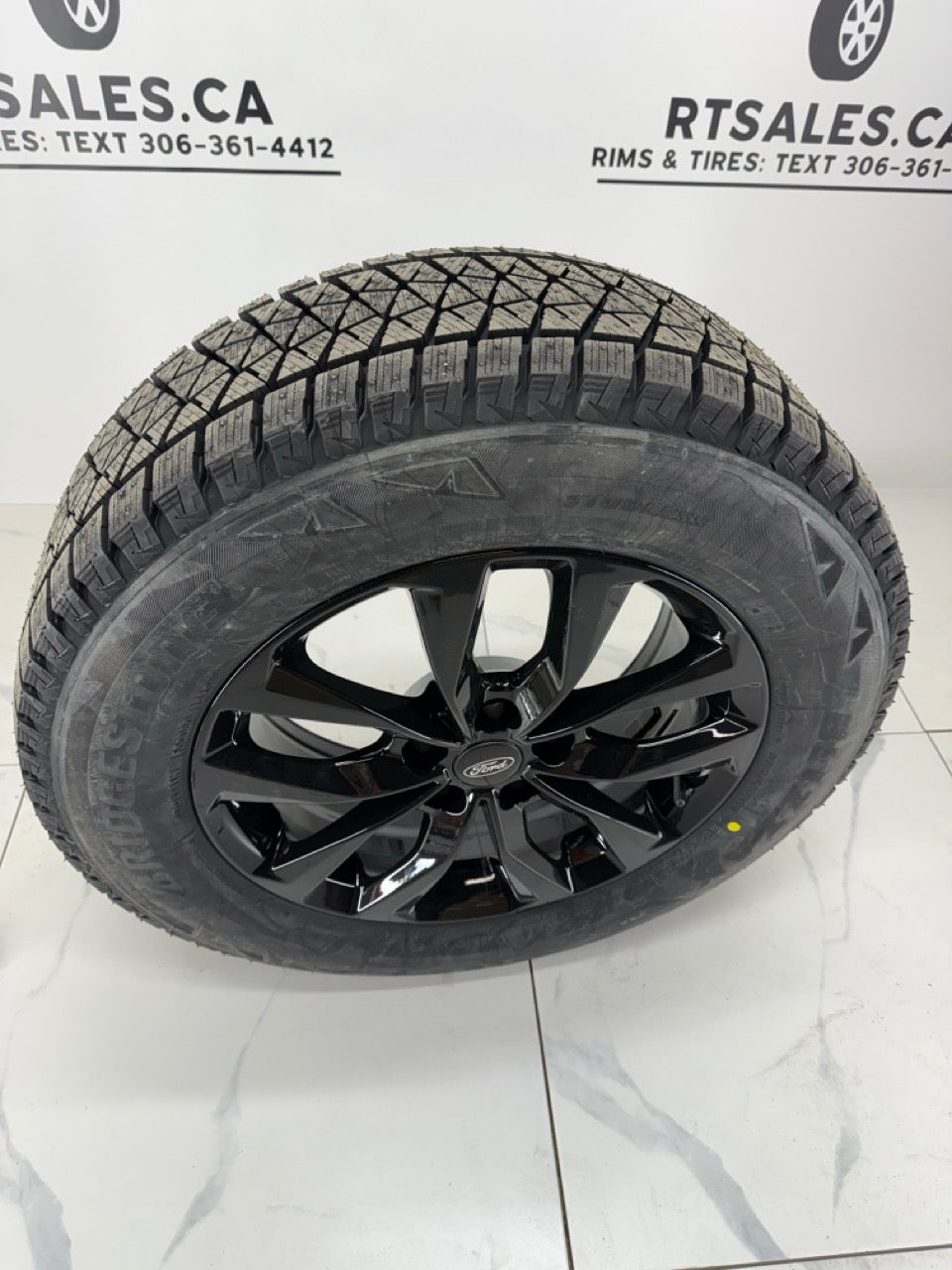 225/65/17 Bridgestone Winter Tires on 17" Rims 5x108