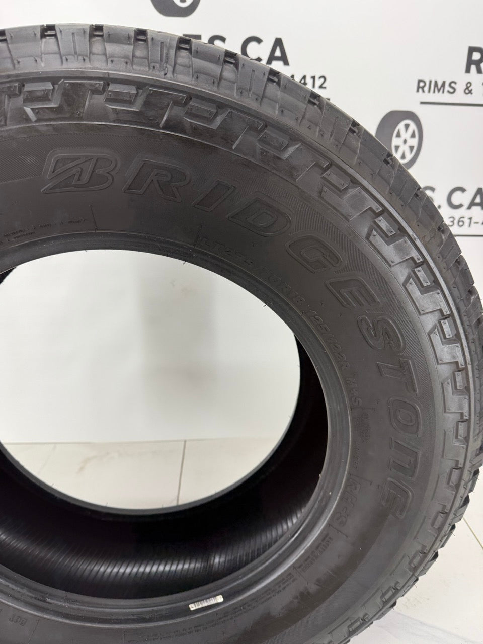 LT 275/70/18 Bridgestone A/T All-Season tires E (Near New)