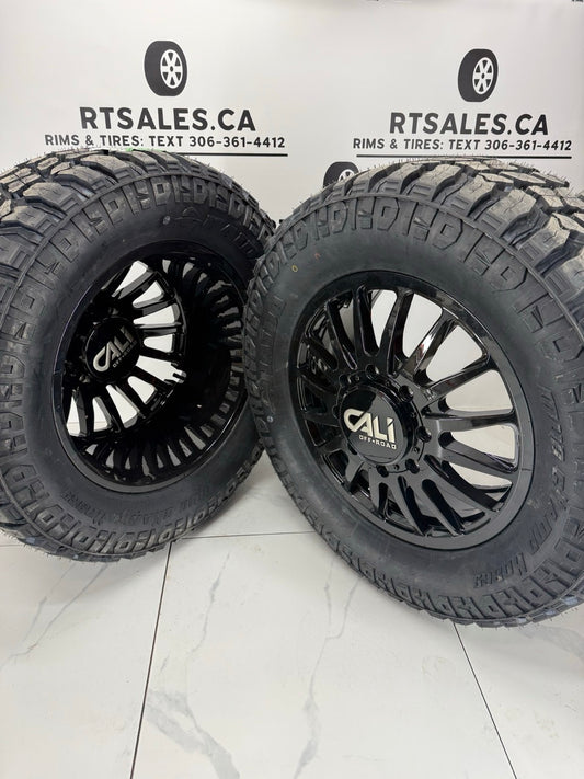 Haida Mud tires on 20x8.25 Cali Summit Gloss Black Dually Rims