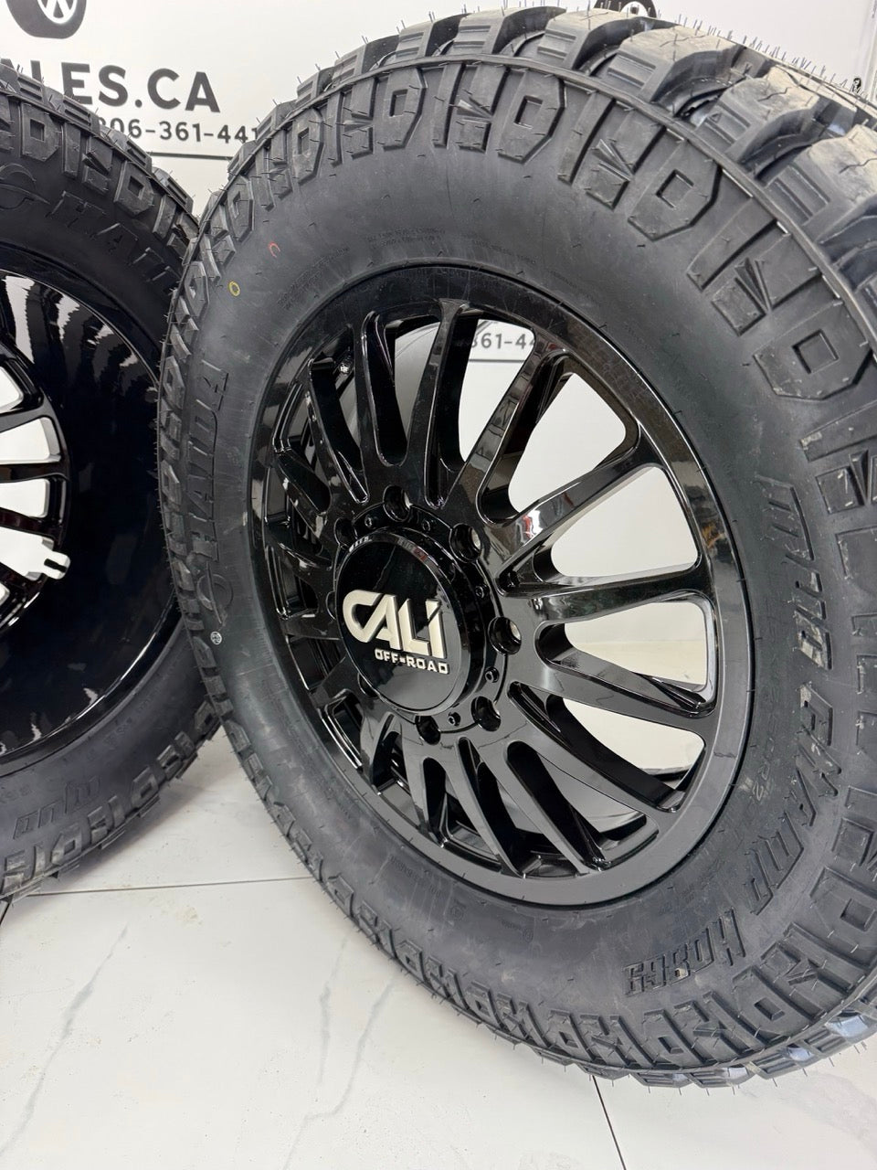 Haida Mud tires on 20x8.25 Cali Summit Gloss Black Dually Rims
