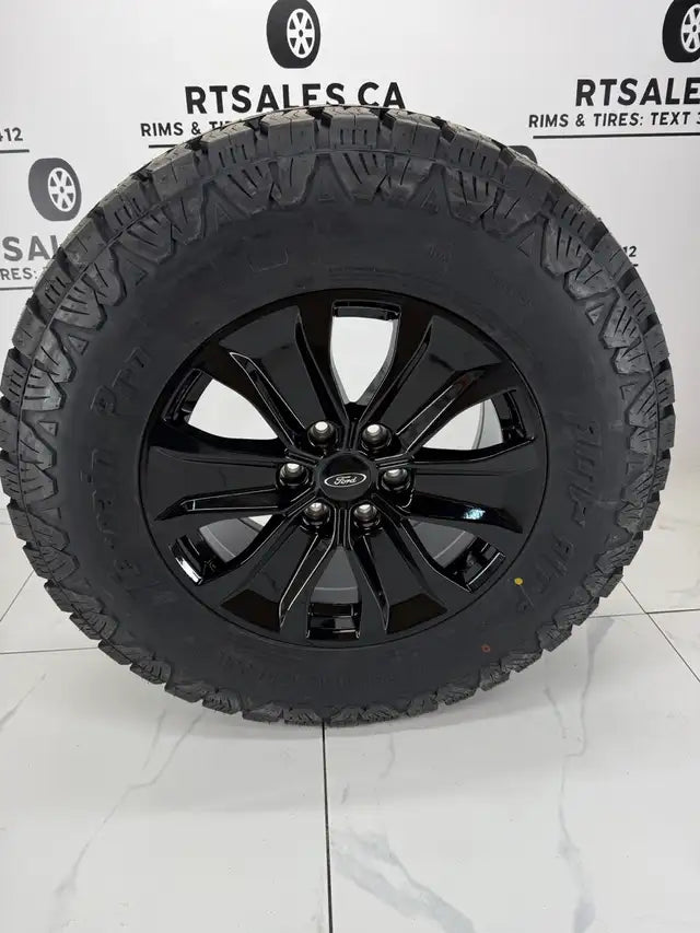 LT 275/70/18 AMP Pro tires on 18x8.5 Replica R250 rims 6x135