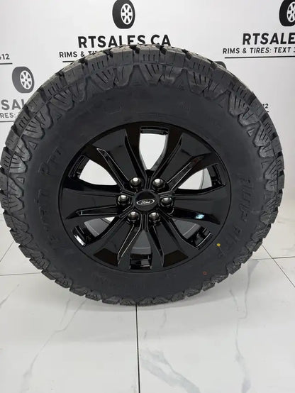 LT 275/70/18 AMP Pro tires on 18x8.5 Replica R250 rims 6x135